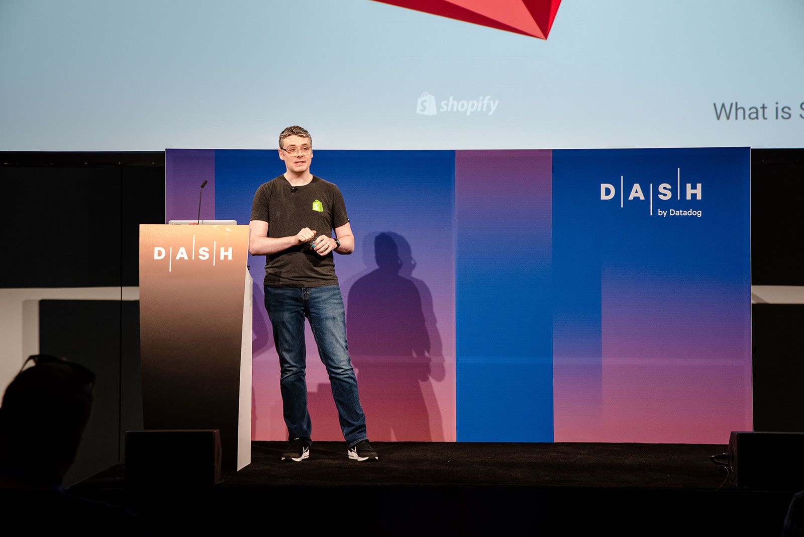 Shopify's Aaron Brady speaking at Dash 2018