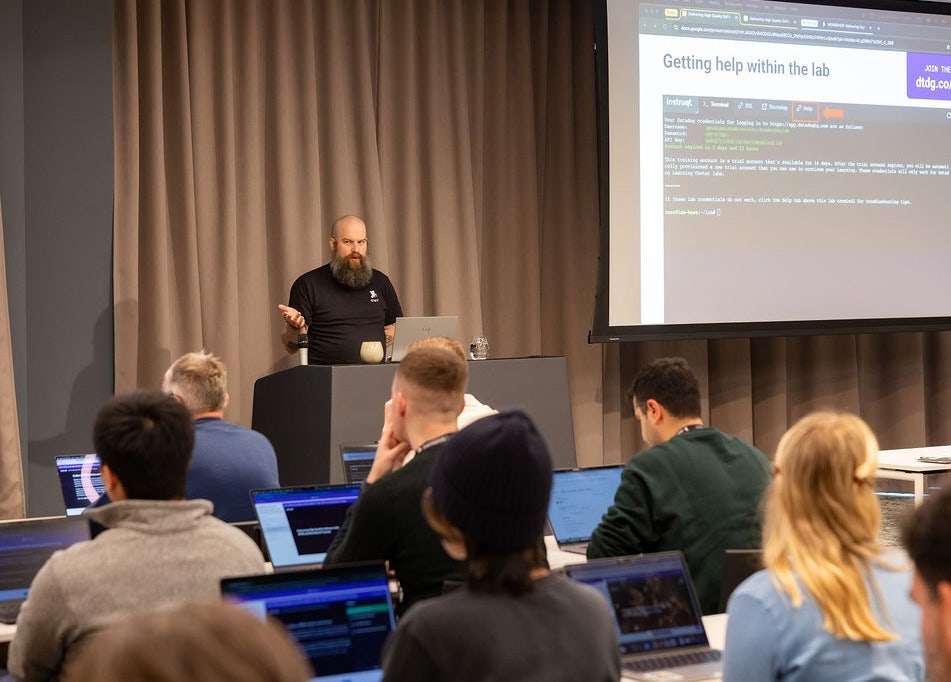 Presenter leading a workshop at a Datadog Summit