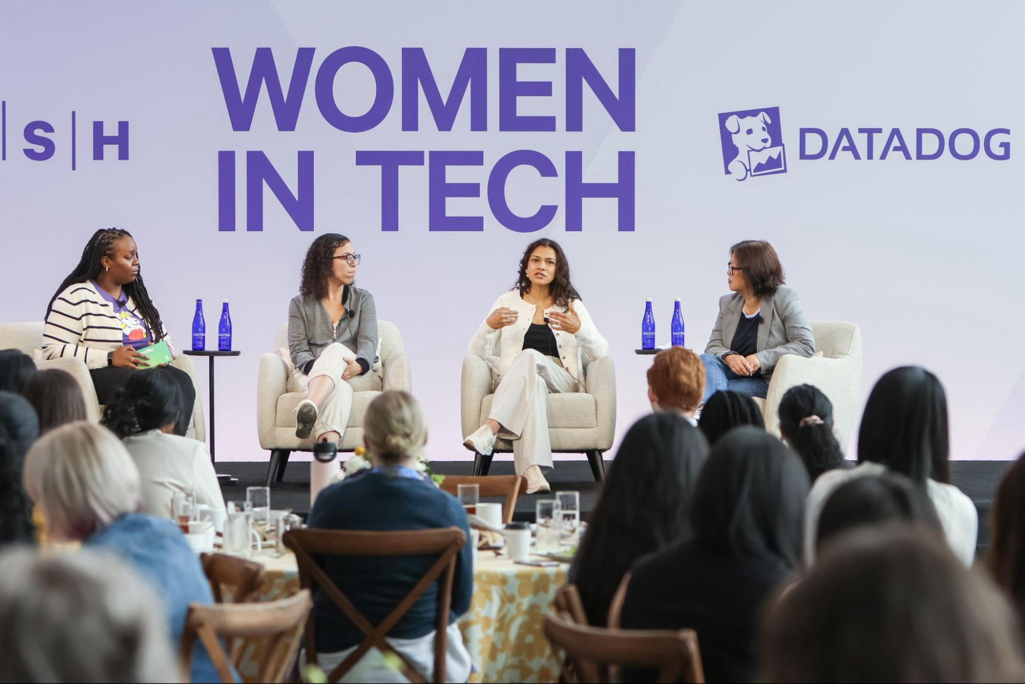 Photo of speakers on stage at Datadog’s Women in Tech Lunch Panel.