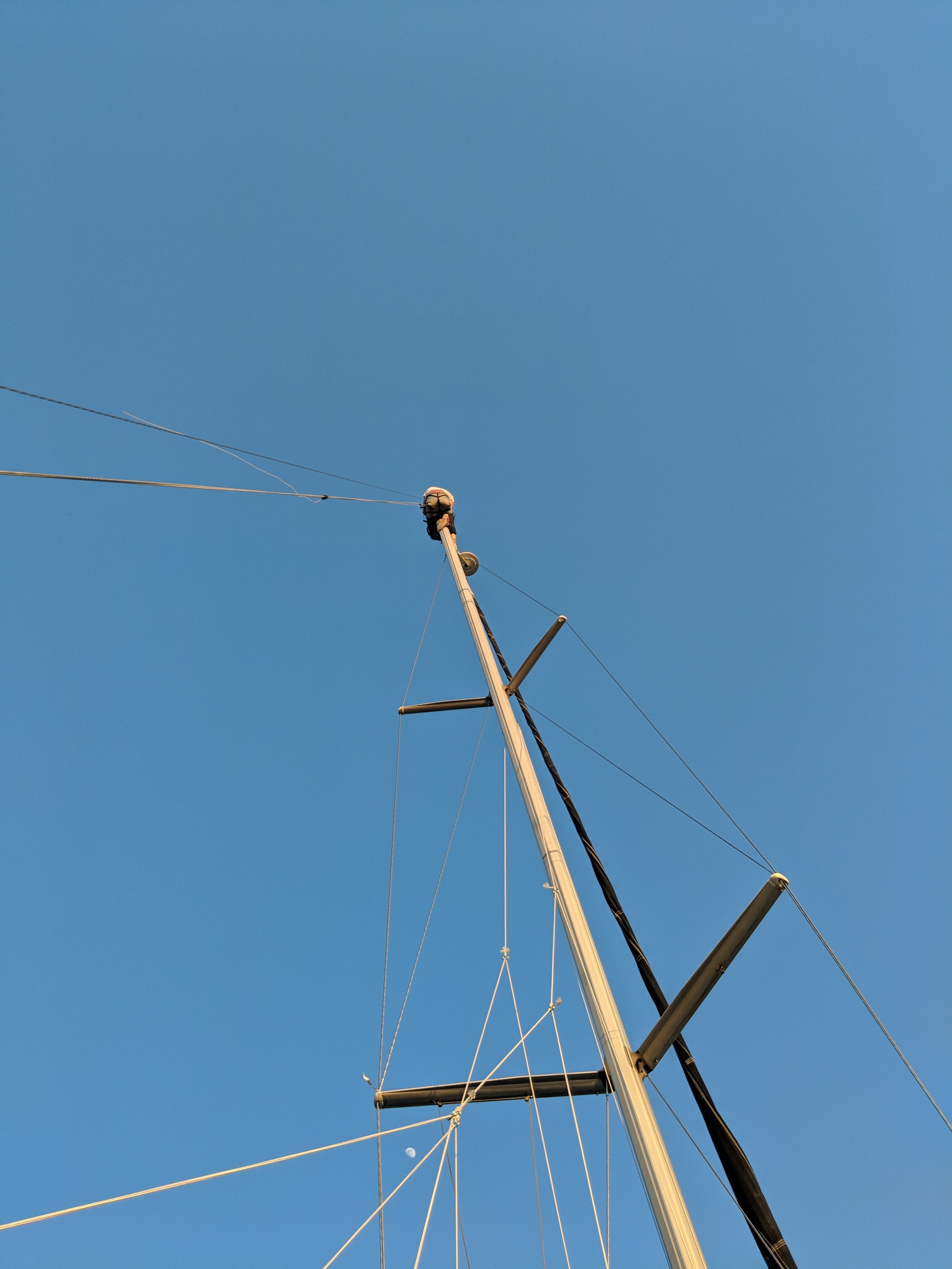 My brave friend on the mast trying to get these wires working.