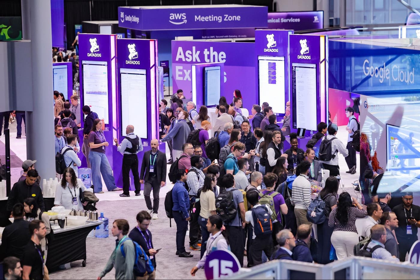 A large group of people at an Ask the Experts demo station in the DASH expo hall. A large group of people at an Ask the Experts demo station in the DASH expo hall.